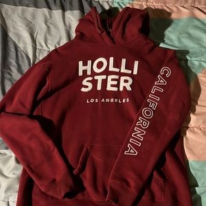 i’m selling a maroon Hollister sweater.